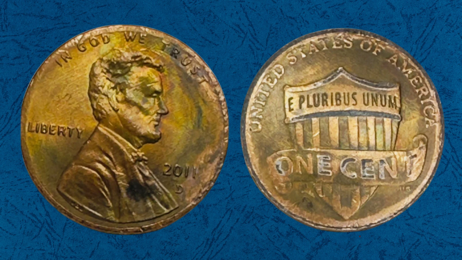 2011 penny retained cud die break error showing raised lump of metal at the coin's rim where die piece broke away